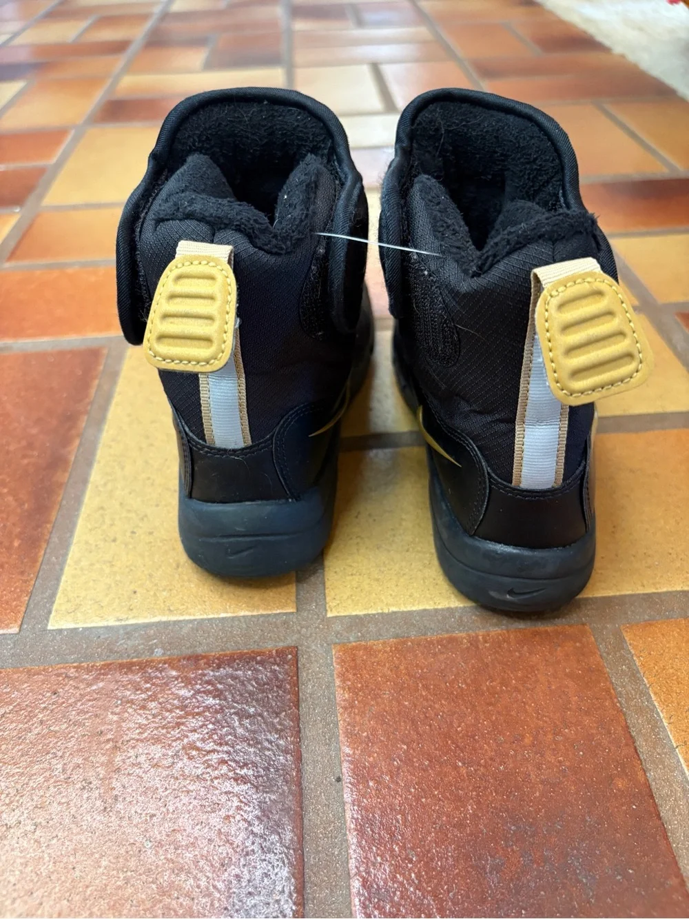 Nike Kids Black Boots with Gold Swoosh
